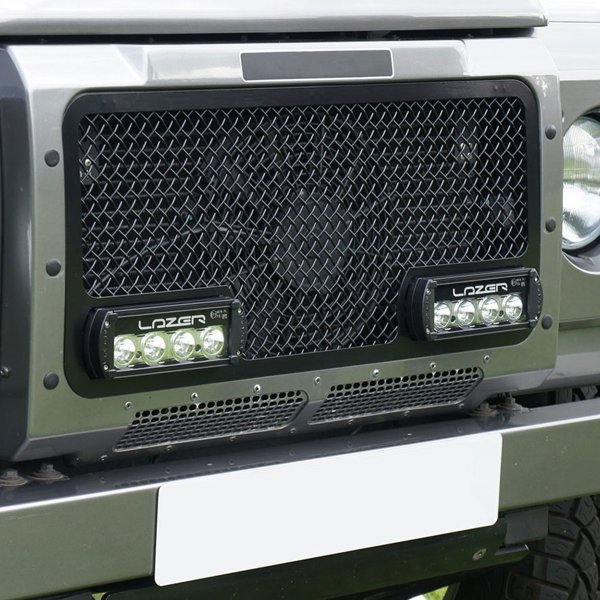 JC4801B - Zunsport Front Defender Black Grille with Lazer RS4 Lights Made from 304 Stainless Steel Black Polymer Coated.