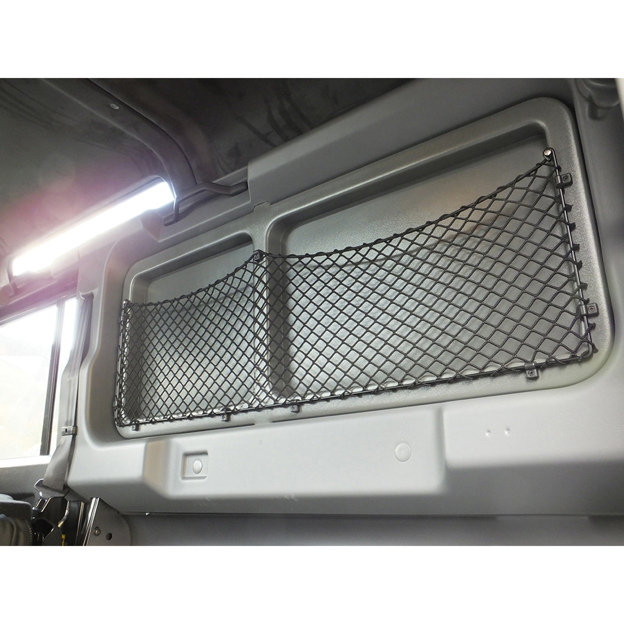 Defender 110 Utility Wagon Trim Panel Supplied As A Pair with Cargo Net