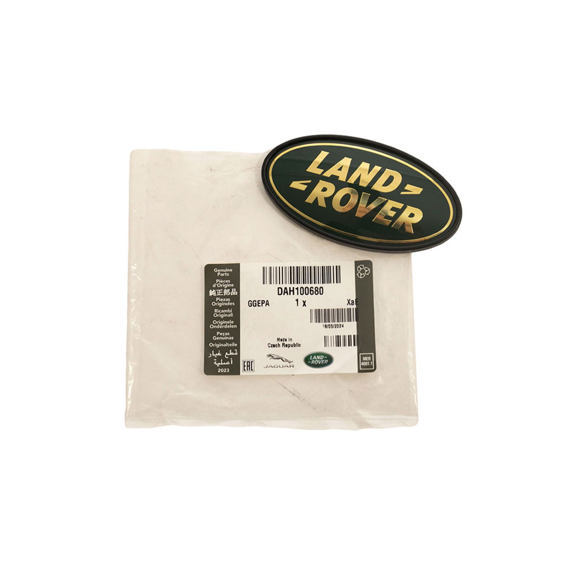 Genuine Oval Badge Gold Letters on Green Background